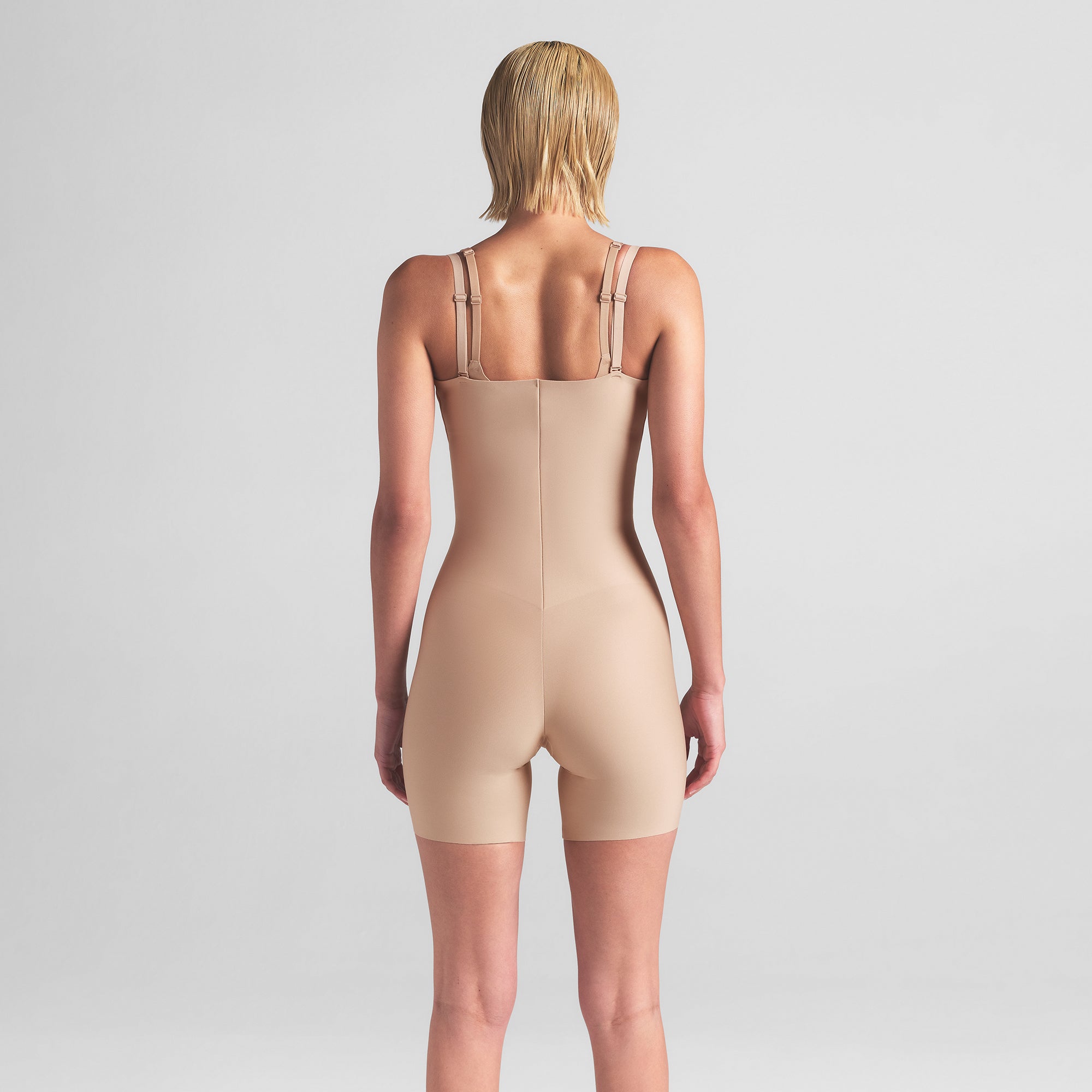 CORE SCULPT OPEN BUST MID THIGH BODYSUIT